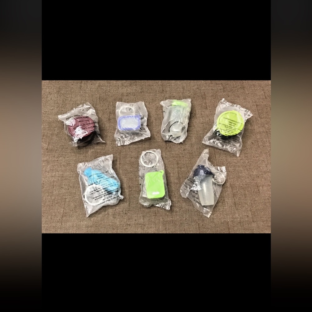 New Tupperware Lot of 7 (6 Keychains & 1 Magnet) No Duplicates - Collectible